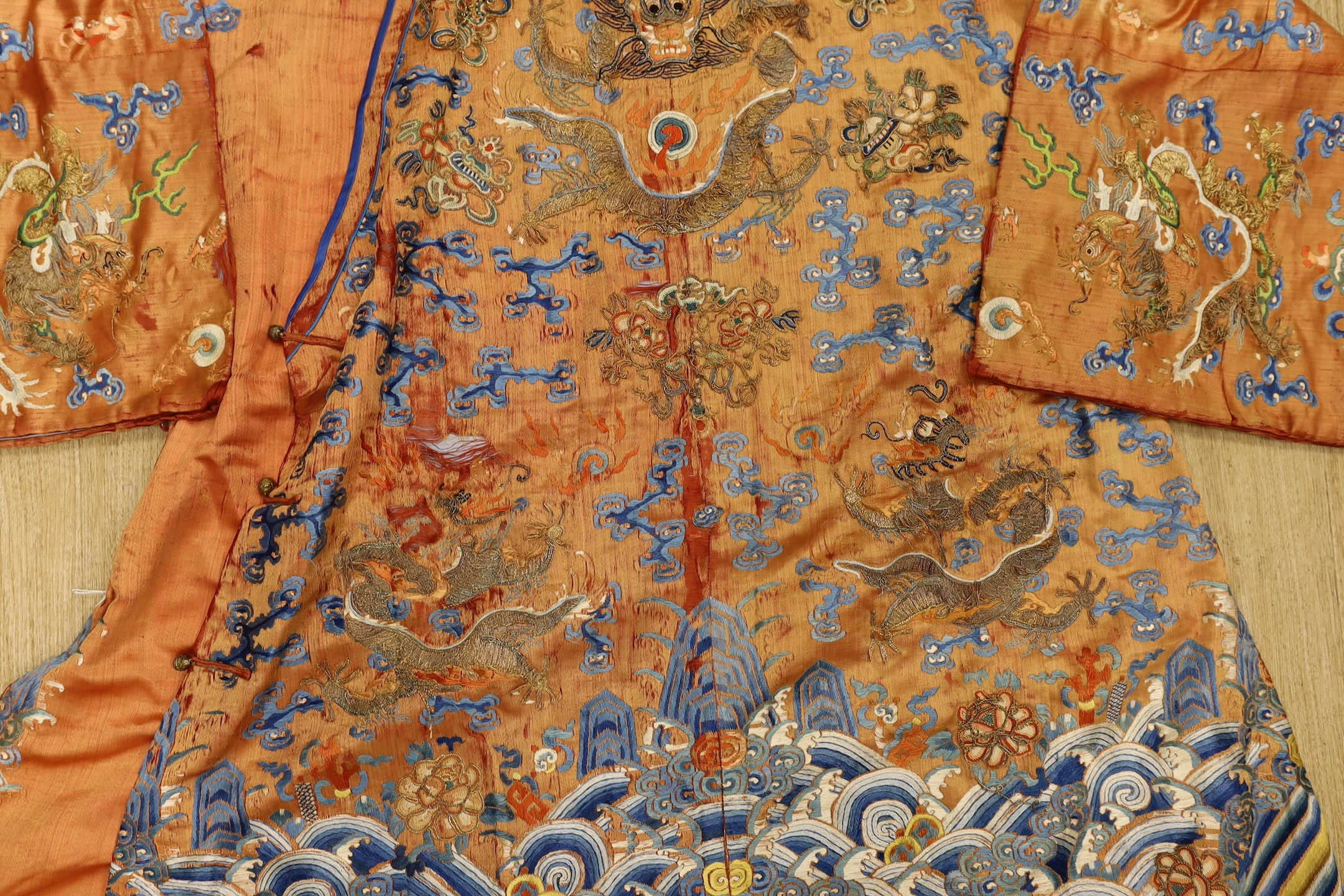 A Chinese embroidered silk dragon robe, late Qing Dynasty